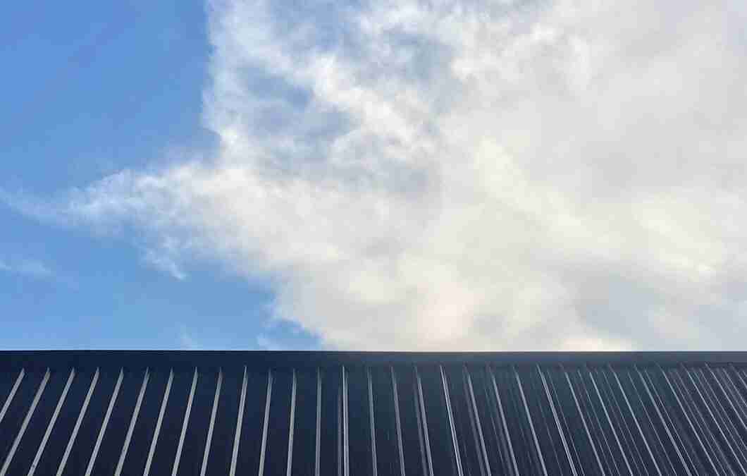 When Should a Business Consider a Commercial Roof Replacement Rather than Repair?